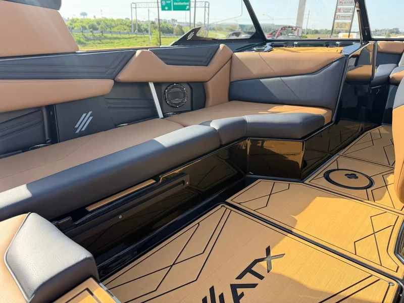 Slide: The Image of The interior of a 2027 ATX Surf Boats 22 Type-S with stylish seating and modern details. - 13