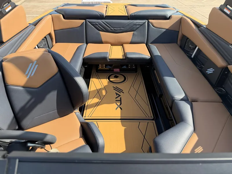 Slide: The Image of The image shows the interior of a 2027 ATX Surf Boats 22 Type-S with stylish seating. - 18