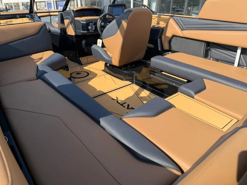 Slide: The Image of The image shows the interior of a 2027 ATX Surf Boats 22 Type-S with modern seating and stylish design. - 12