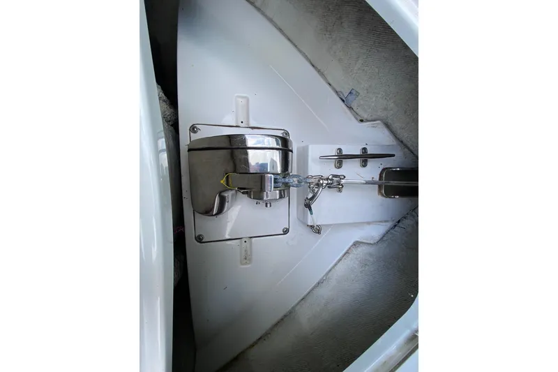 Slide: The Image of 2018 Sportsman Open 242 Center Console anchor compartment with stainless steel fittings. - 20