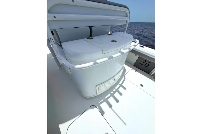 Slide: The Image of 2018 Yellowfin 26 Hybrid boat deck with seating and ocean view. - 13