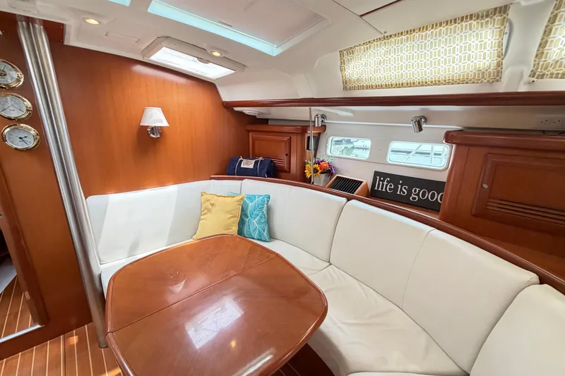 Slide: The Image of Luxurious interior of a 2007 Beneteau 423 yacht with elegant seating and decor. - 36