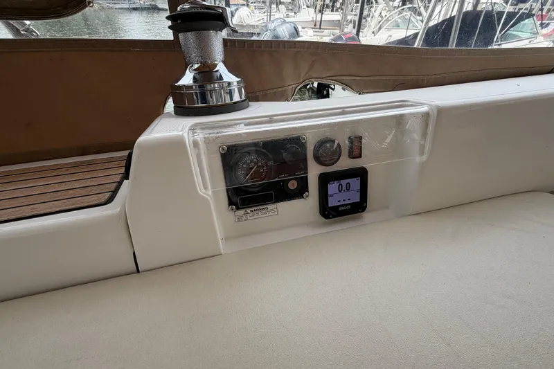 Slide: The Image of Control panel of a 2007 Beneteau 423 sailboat with navigation instruments. - 14