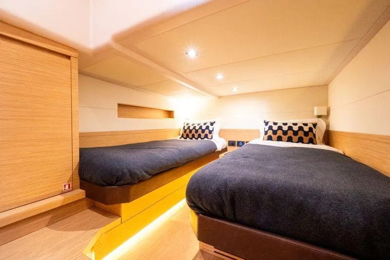 Slide: The Image of Luxurious cabin interior of 2020 Pardo Yachts 50 with twin beds and modern decor. - 69