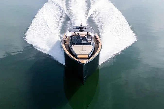 Slide: The Image of 2020 Pardo Yachts 50 cruising on calm water, creating a dynamic wake pattern. - 14