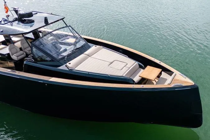 Slide: The Image of Luxurious 2020 Pardo Yachts 50 on serene water, featuring sleek design and spacious deck. - 34