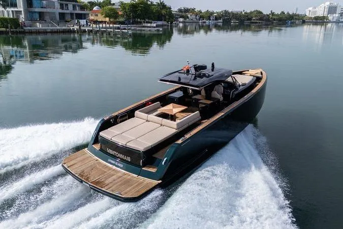 Slide: The Image of Luxury 2020 Pardo Yachts 50 cruising on calm waters, showcasing sleek design and spacious deck. - 2