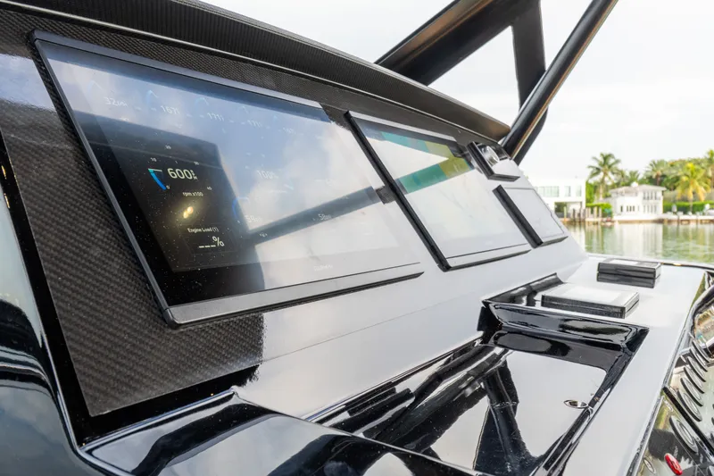 Slide: The Image of Dashboard of 2020 Pardo Yachts 50 with advanced navigation screens. - 49