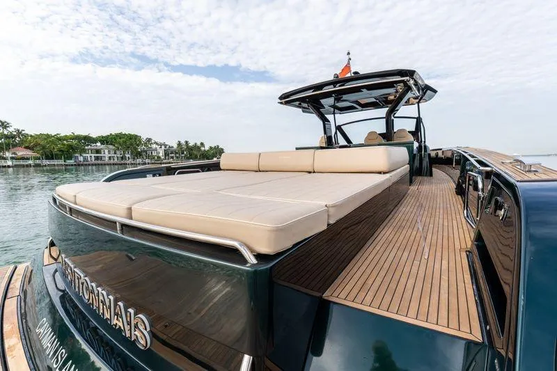 Slide: The Image of 2020 Pardo Yachts 50 with spacious deck and luxurious seating on calm waters. - 48