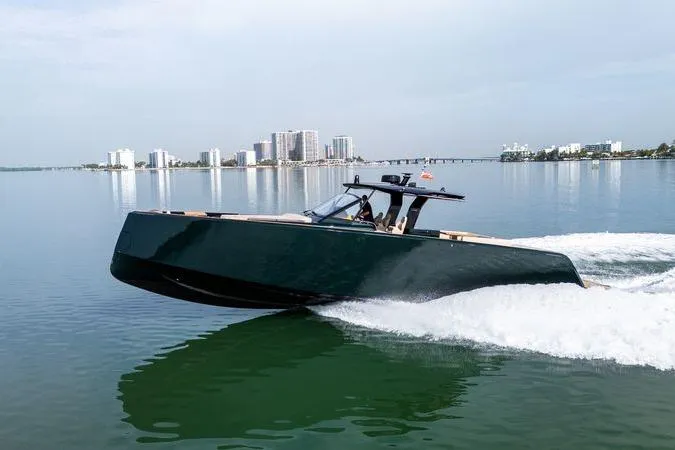 The Image of 2020 Pardo Yachts 50 cruising on calm waters near a city skyline. - 0