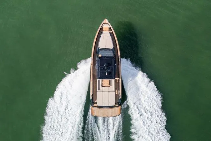Slide: The Image of Aerial view of 2020 Pardo Yachts 50 cruising on open water. - 12