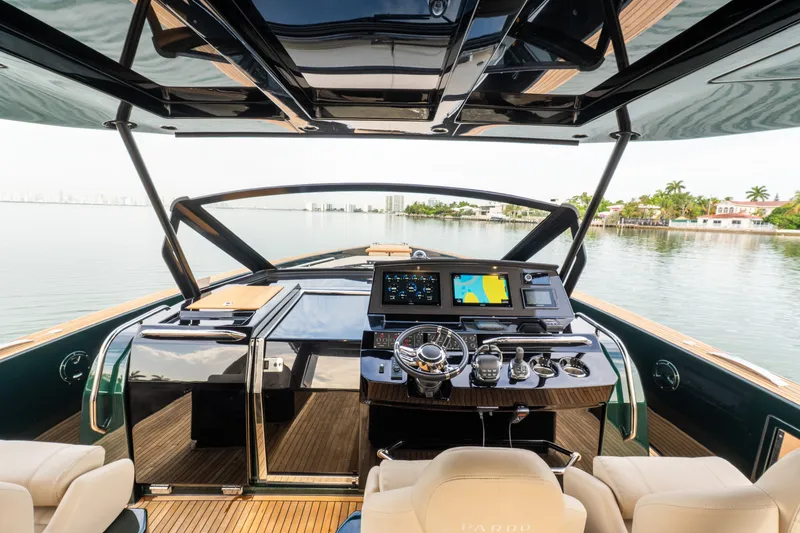 Slide: The Image of Cockpit view of 2020 Pardo Yachts 50, featuring modern navigation equipment and luxurious seating. - 93