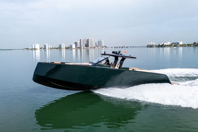 Slide: The Image of 2020 Pardo Yachts 50 cruising on calm waters near a city skyline. - 38