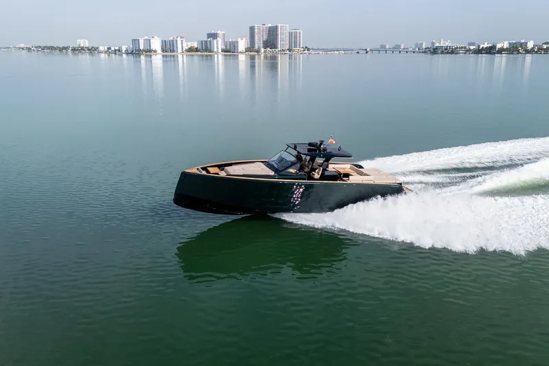 Slide: The Image of 2020 Pardo Yachts 50 cruising on calm waters near a city skyline. - 36