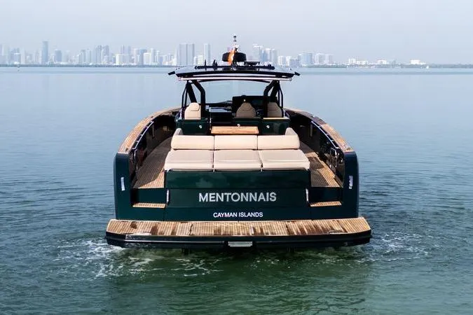 Slide: The Image of Luxury Pardo Yachts 50, 2020 model, cruising near city skyline, Cayman Islands. - 8