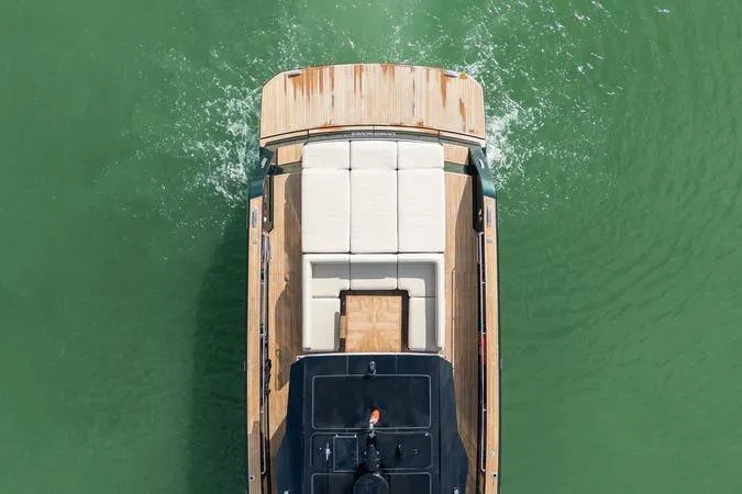 Slide: The Image of Top view of 2020 Pardo Yachts 50 cruising on green water. - 20