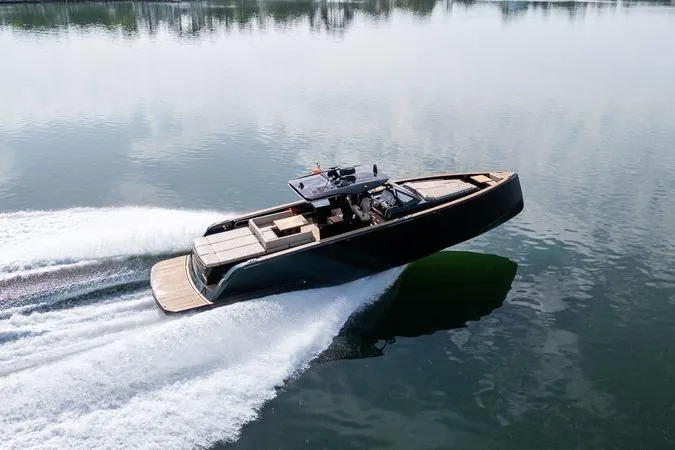 Slide: The Image of 2020 Pardo Yachts 50 cruising on calm water, showcasing sleek design and luxury features. - 5