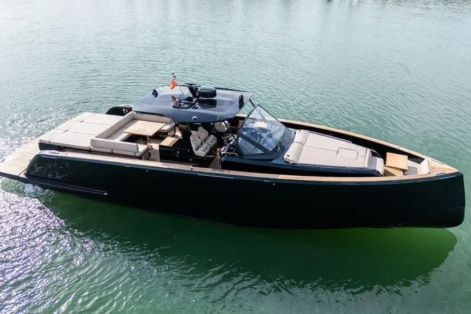 Slide: The Image of Luxury 2020 Pardo Yachts 50 cruising on calm waters, showcasing sleek design and spacious deck. - 33