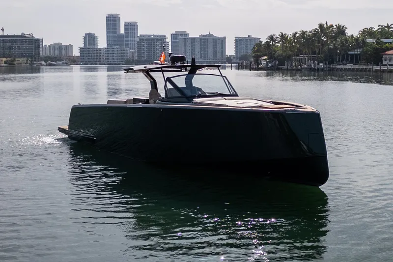 Slide: The Image of 2020 Pardo Yachts 50 cruising in a scenic urban waterway. - 18