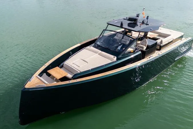Slide: The Image of Luxury 2020 Pardo Yachts 50 cruising on calm waters, showcasing sleek design and spacious deck. - 35