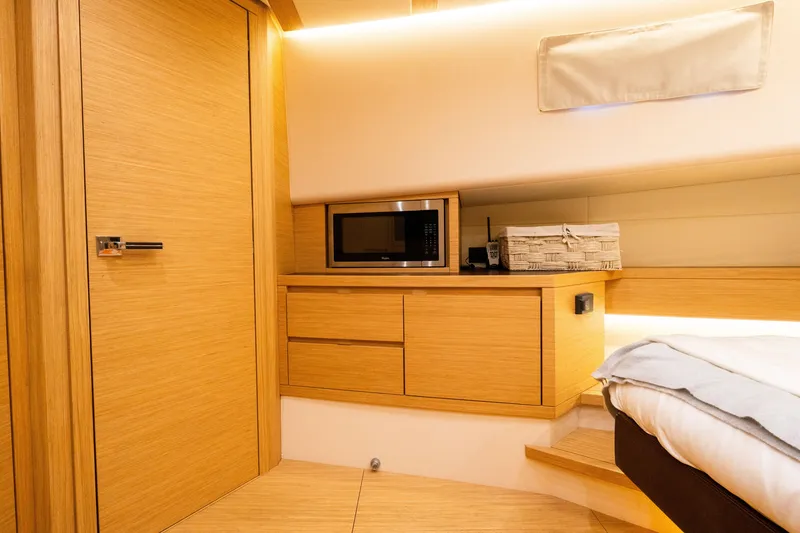 Slide: The Image of Luxurious interior of 2020 Pardo Yachts 50, featuring wooden cabinetry and modern amenities. - 75