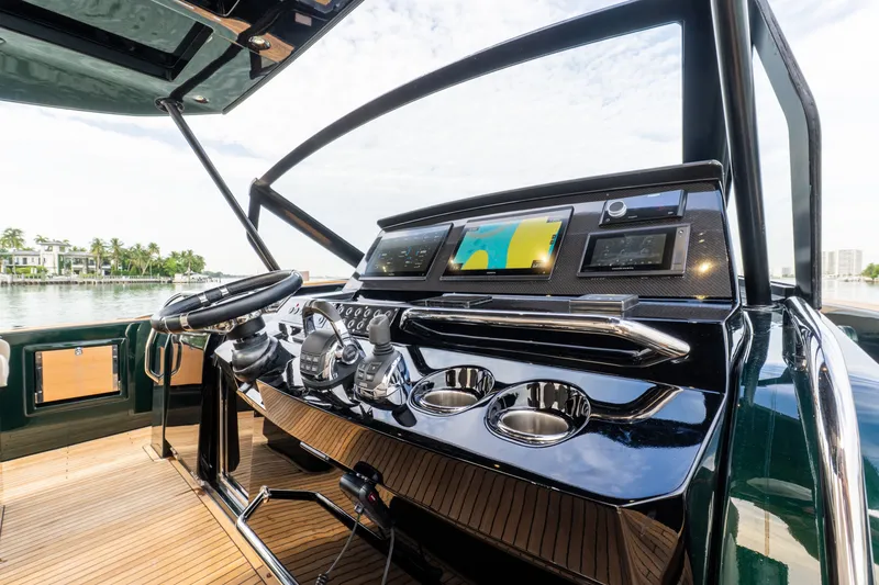Slide: The Image of Helm of 2020 Pardo Yachts 50, featuring modern navigation displays and controls. - 87