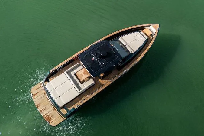 Slide: The Image of 2020 Pardo Yachts 50 cruising on calm green waters, aerial view. - 17