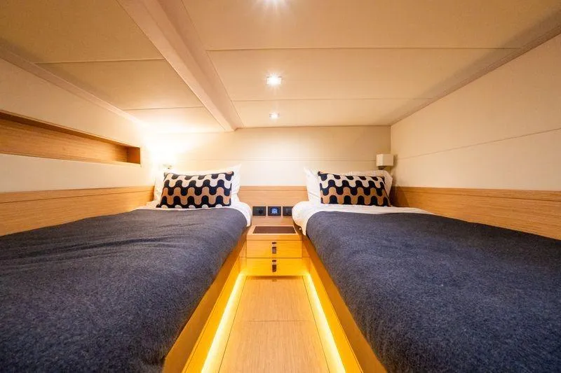 Slide: The Image of Luxurious twin cabin interior of 2020 Pardo Yachts 50, featuring modern design and ambient lighting. - 62