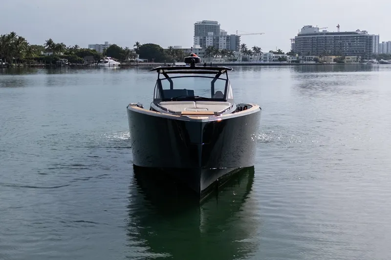 Slide: The Image of Front view of a 2020 Pardo Yachts 50 on calm water near urban skyline. - 17