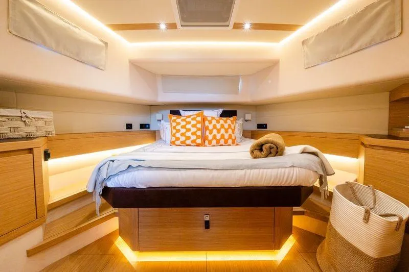 Slide: The Image of Luxurious cabin interior of 2020 Pardo Yachts 50, featuring elegant bedding and ambient lighting. - 66