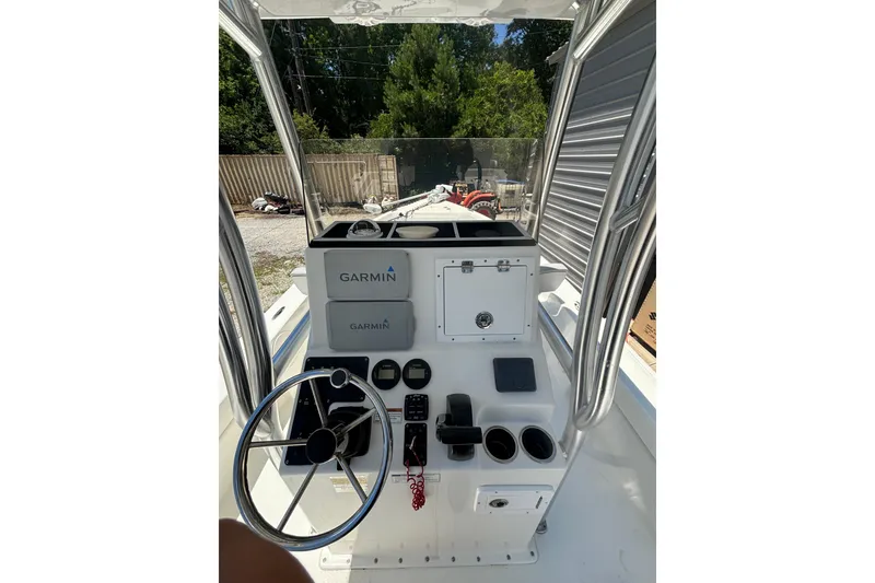 Slide: The Image of 2021 KenCraft Bayrider boat console with Garmin navigation system and steering wheel. - 3