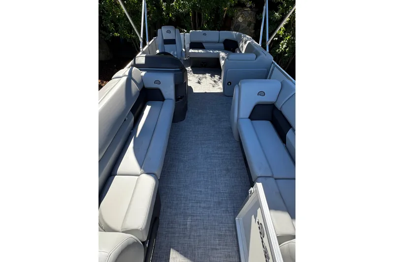 Slide: The Image of 2026 Sun Tracker Party Barge 20 DLX interior with spacious seating and modern design. - 12