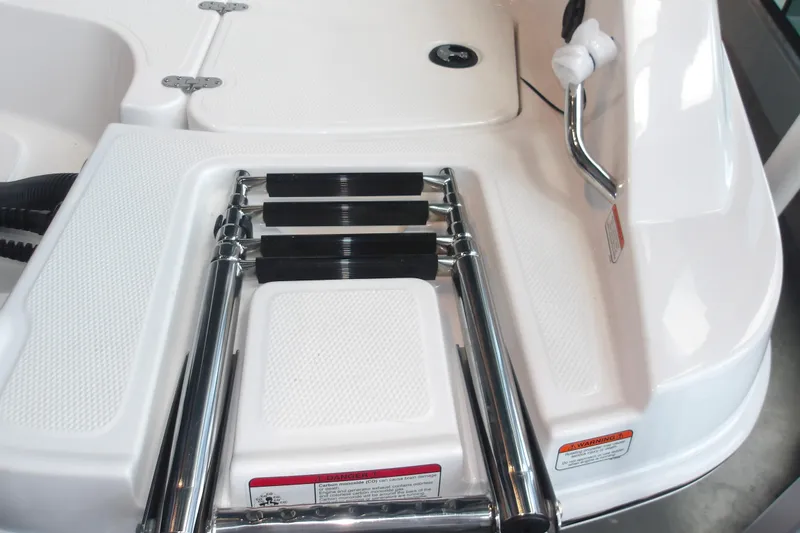 Slide: The Image of 2026 Tahoe 2150 boat swim platform with foldable ladder and safety features. - 12