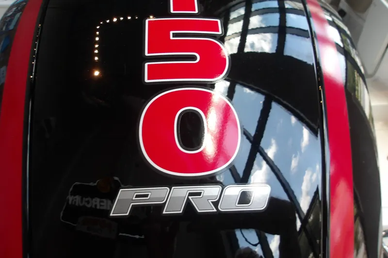 Slide: The Image of Close-up of 2026 Tahoe 2150 engine cover with bold red and silver '150 PRO' lettering. - 11