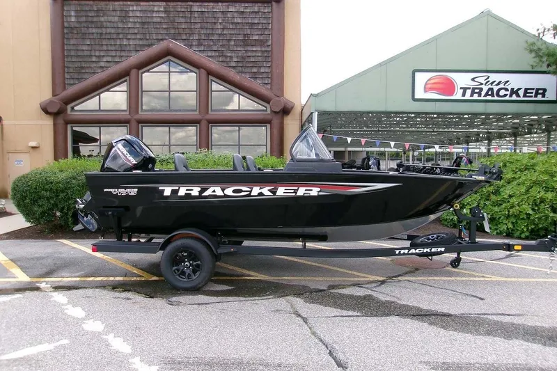 The Image of 2026 Tracker Pro Guide V-175 WT boat on trailer outside dealership. - 0