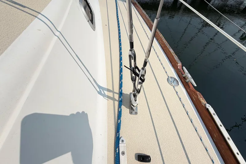 Slide: The Image of Deck view of a 1991 Tartan 28 Piper sailboat with rigging details. - 4