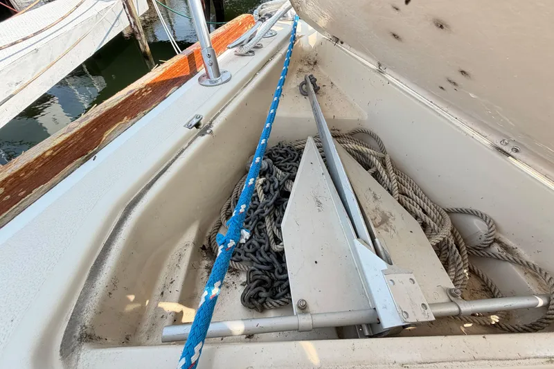 Slide: The Image of Anchor and chain storage on a 1991 Tartan 28 Piper sailboat. - 7