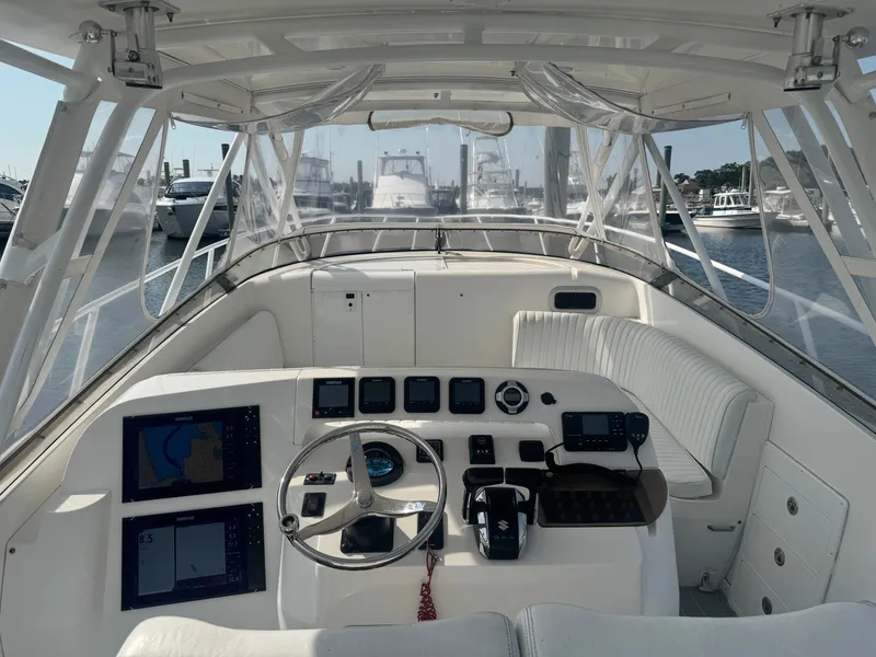 Slide: The Image of The image shows the cockpit of a 2002 Intrepid 377 Walkaround with modern electronics and controls. - 7