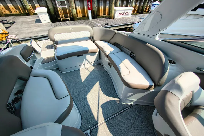 Slide: The Image of Interior of 2023 Crownline 290 SS boat with luxurious seating and modern design. - 4