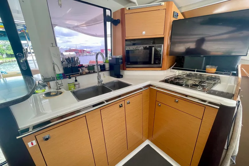 Slide: The Image of Modern kitchen interior of 2013 Fountaine Pajot Lipari 41 catamaran with appliances and sink. - 19