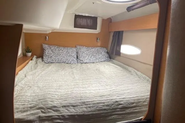 Slide: The Image of Cozy cabin interior of 2013 Fountaine Pajot Lipari 41 catamaran with double bed. - 28