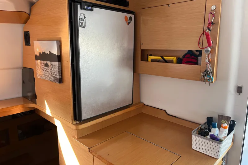 Slide: The Image of Interior of 2013 Fountaine Pajot Lipari 41 catamaran with compact kitchen setup. - 20