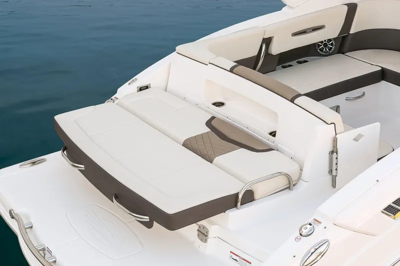 Slide: The Image of 2019 Chaparral 317 SSX boat with spacious rear seating and sun pad. - 12