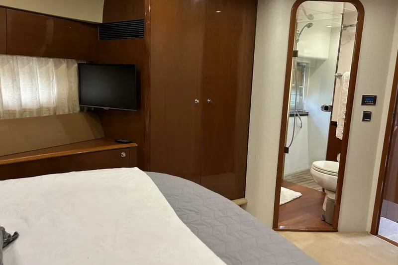 Slide: The Image of Luxurious interior of 2008 Princess 67 Flybridge Motor Yacht with ensuite bathroom and TV. - 30