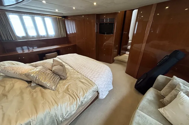 Slide: The Image of Luxurious bedroom interior of 2008 Princess 67 Flybridge Motor Yacht with elegant furnishings. - 28