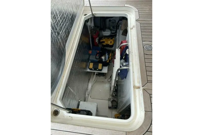 Slide: The Image of Storage compartment on 2008 Princess 67 Flybridge Motor Yacht, featuring tools and equipment. - 35