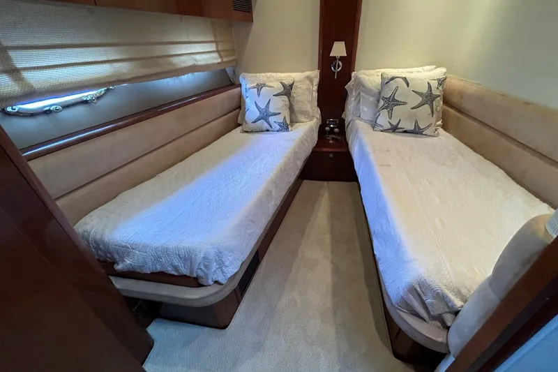 Slide: The Image of Twin beds in a cozy cabin of a 2008 Princess 67 Flybridge Motor Yacht. - 33