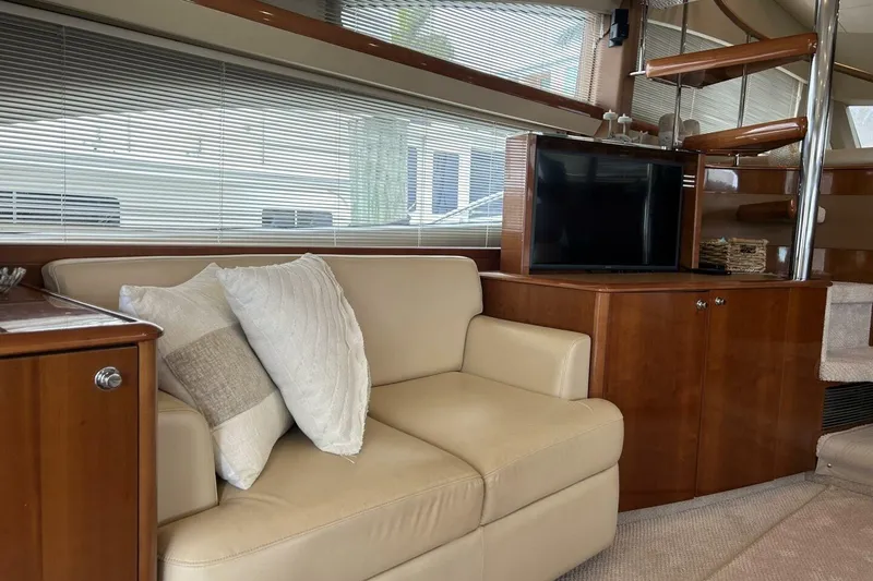Slide: The Image of Luxurious interior of 2008 Princess 67 Flybridge Motor Yacht with beige sofa and TV. - 20