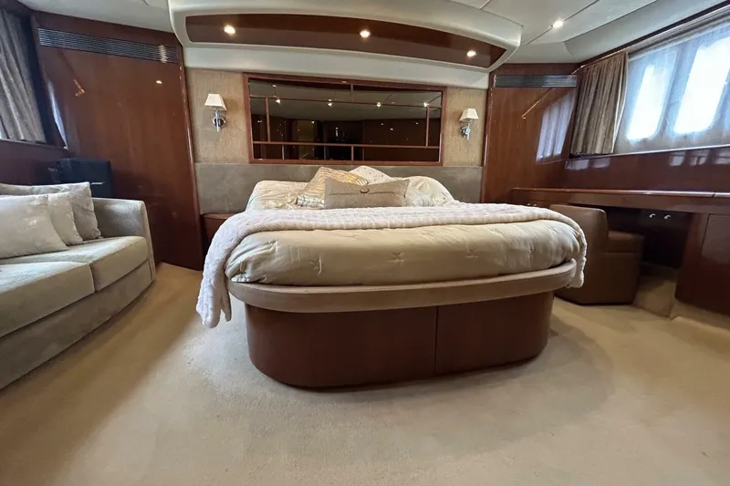 Slide: The Image of Luxurious bedroom interior of 2008 Princess 67 Flybridge Motor Yacht with elegant furnishings. - 27