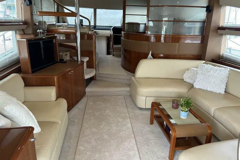 Slide: The Image of Luxurious interior of 2008 Princess 67 Flybridge Motor Yacht with elegant seating and decor. - 18